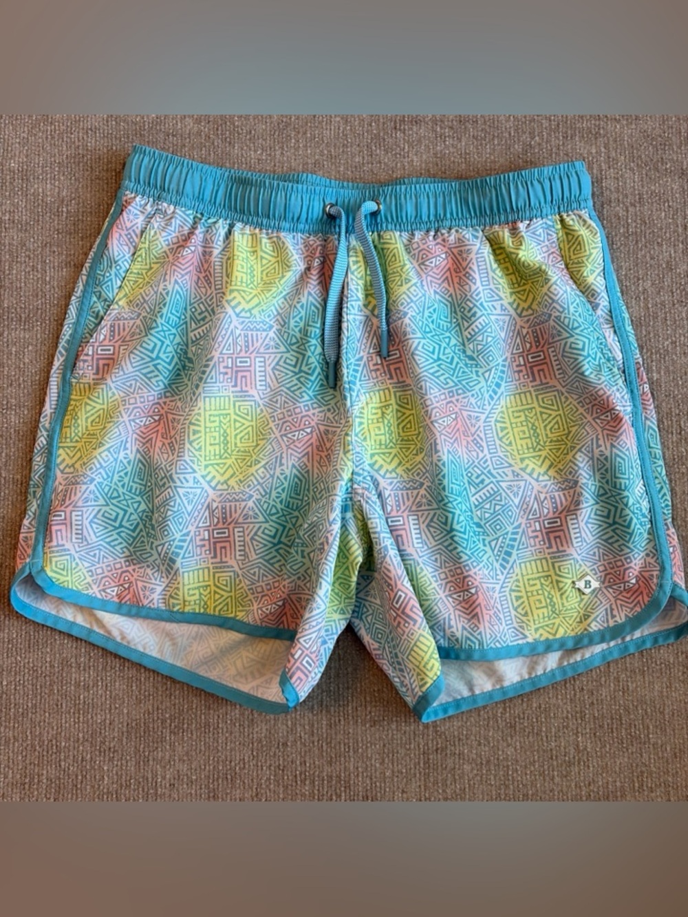 BURLEBO Teal Pocket Swim Shorts with Pastel Geometric Print